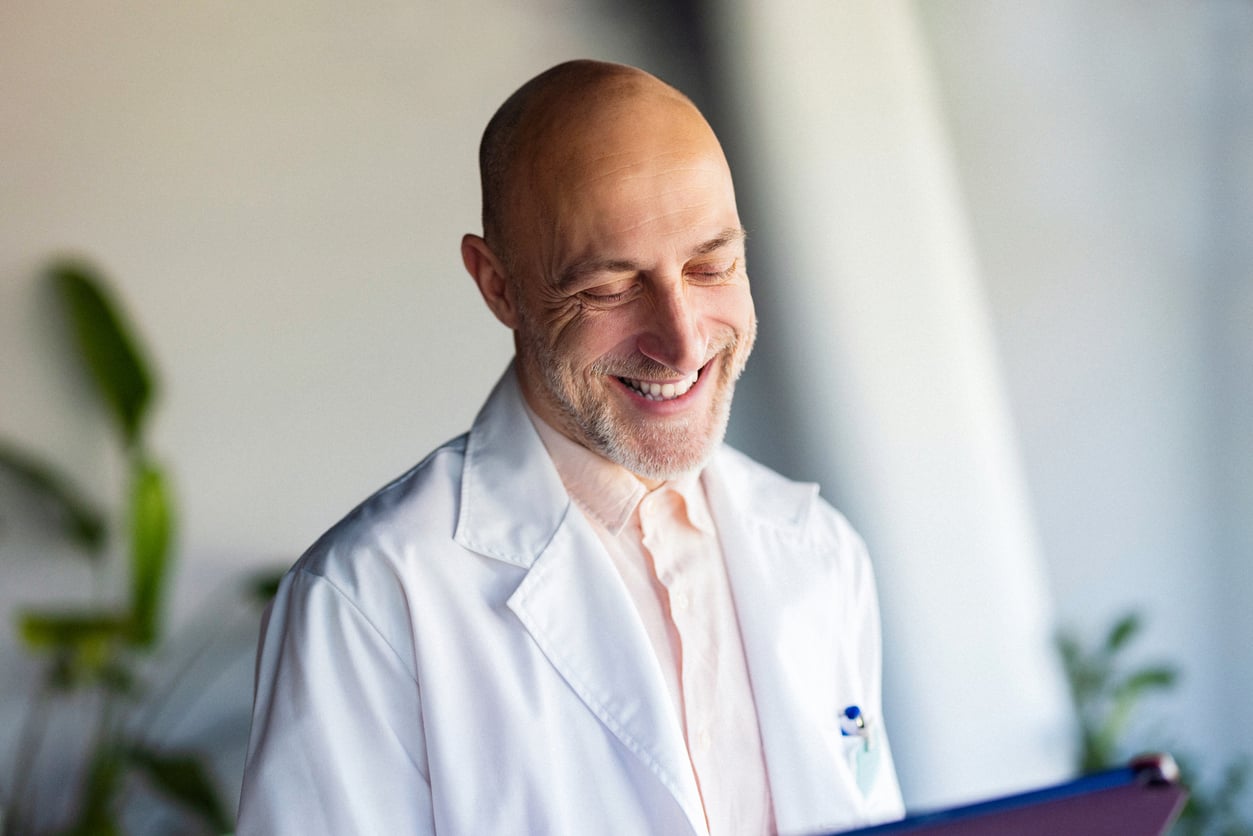 Physician reviewing benefit options