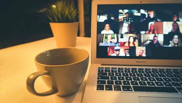 multiple people on a zoom call on laptop