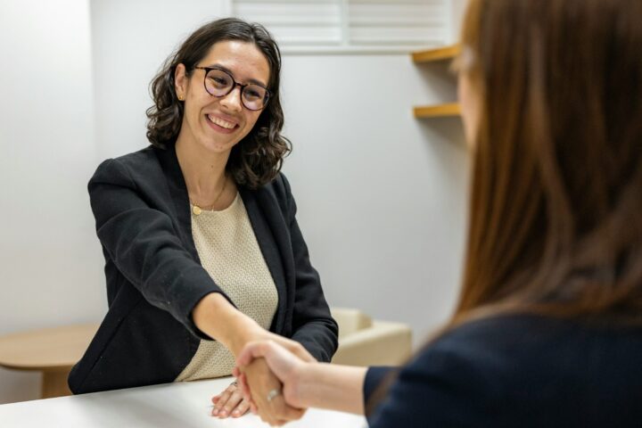 business women shaking hands
