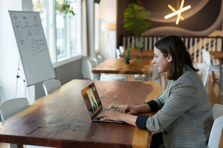 woman-taking-call-from-computer