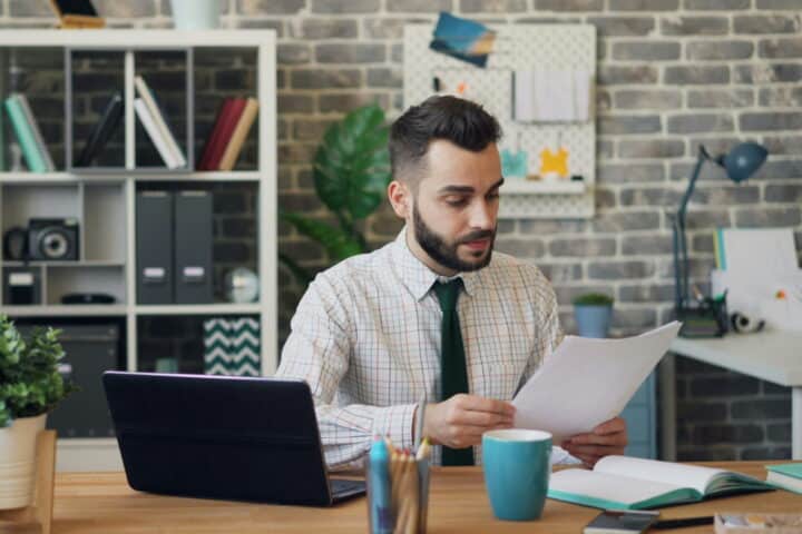 hr professional reviewing employee documents