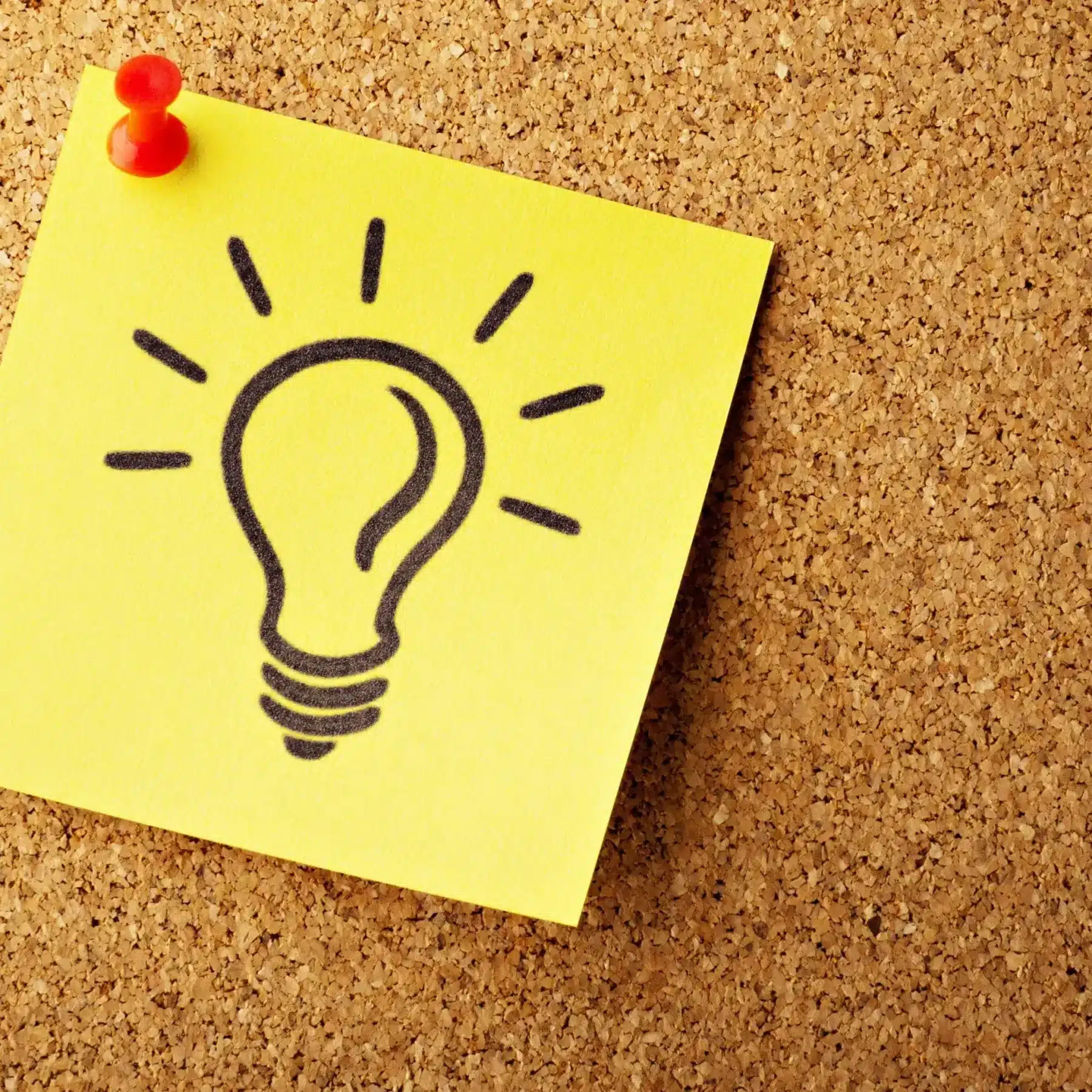 light bulb post it note on corkboard