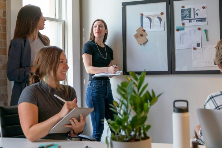 employees gathering in conference room